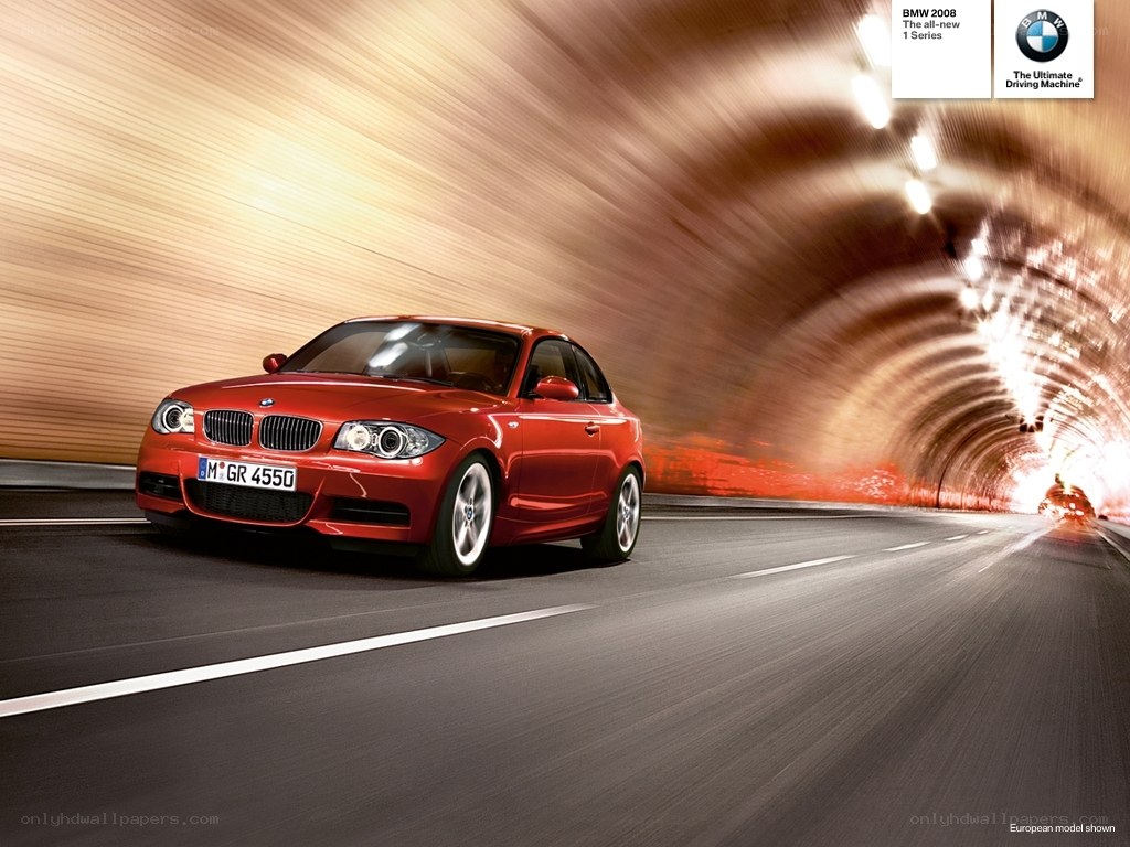 Red BMW 1 Series in tunnel