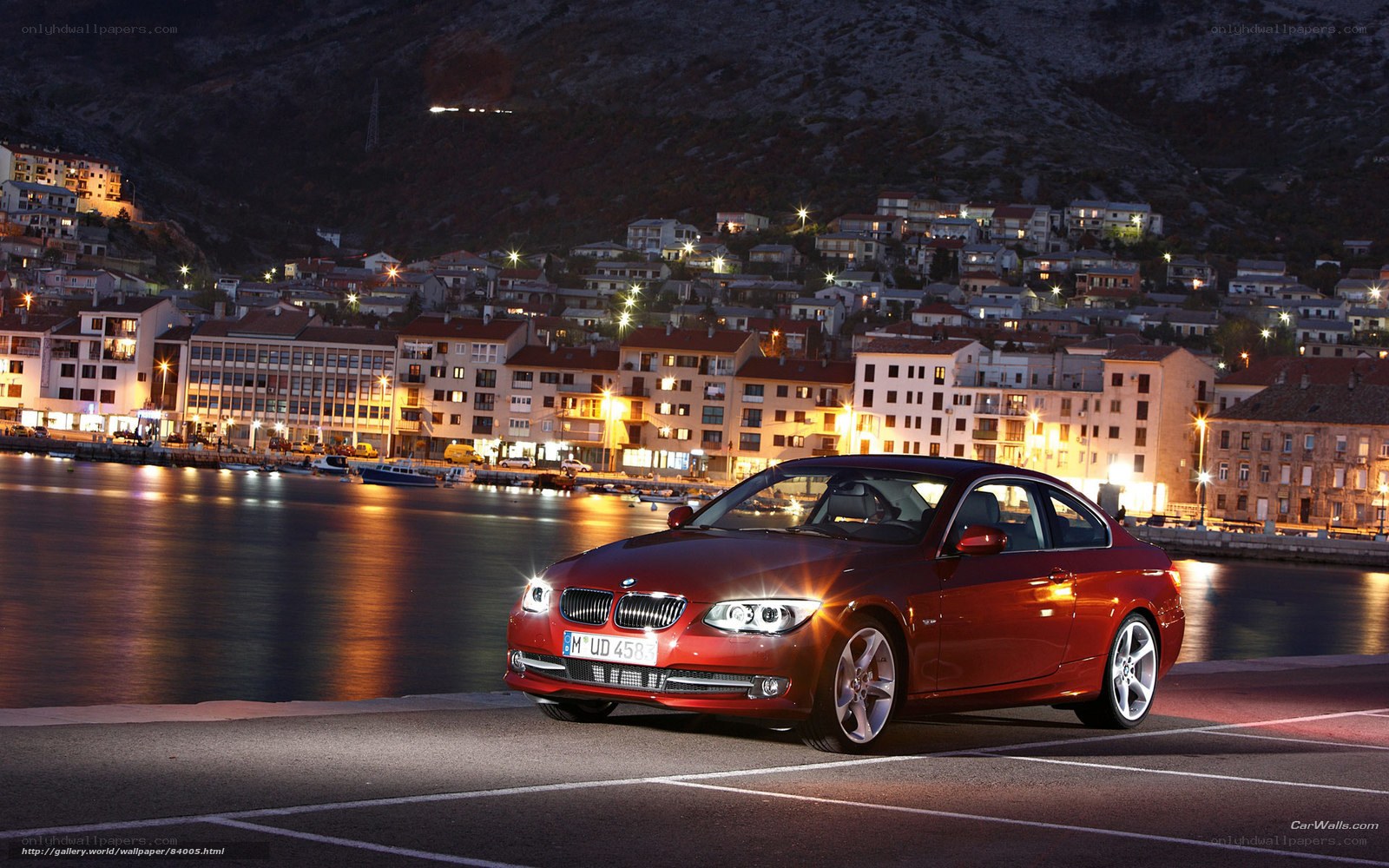 Red BMW 3-Series at night