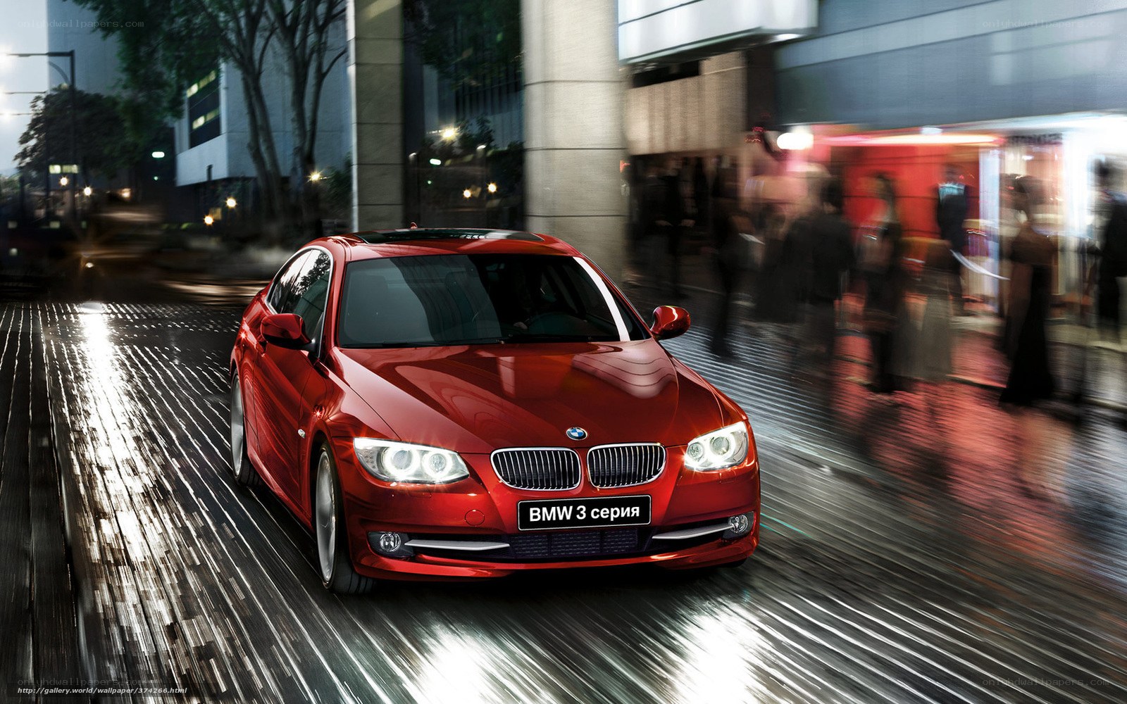 Red BMW 3 Series in city