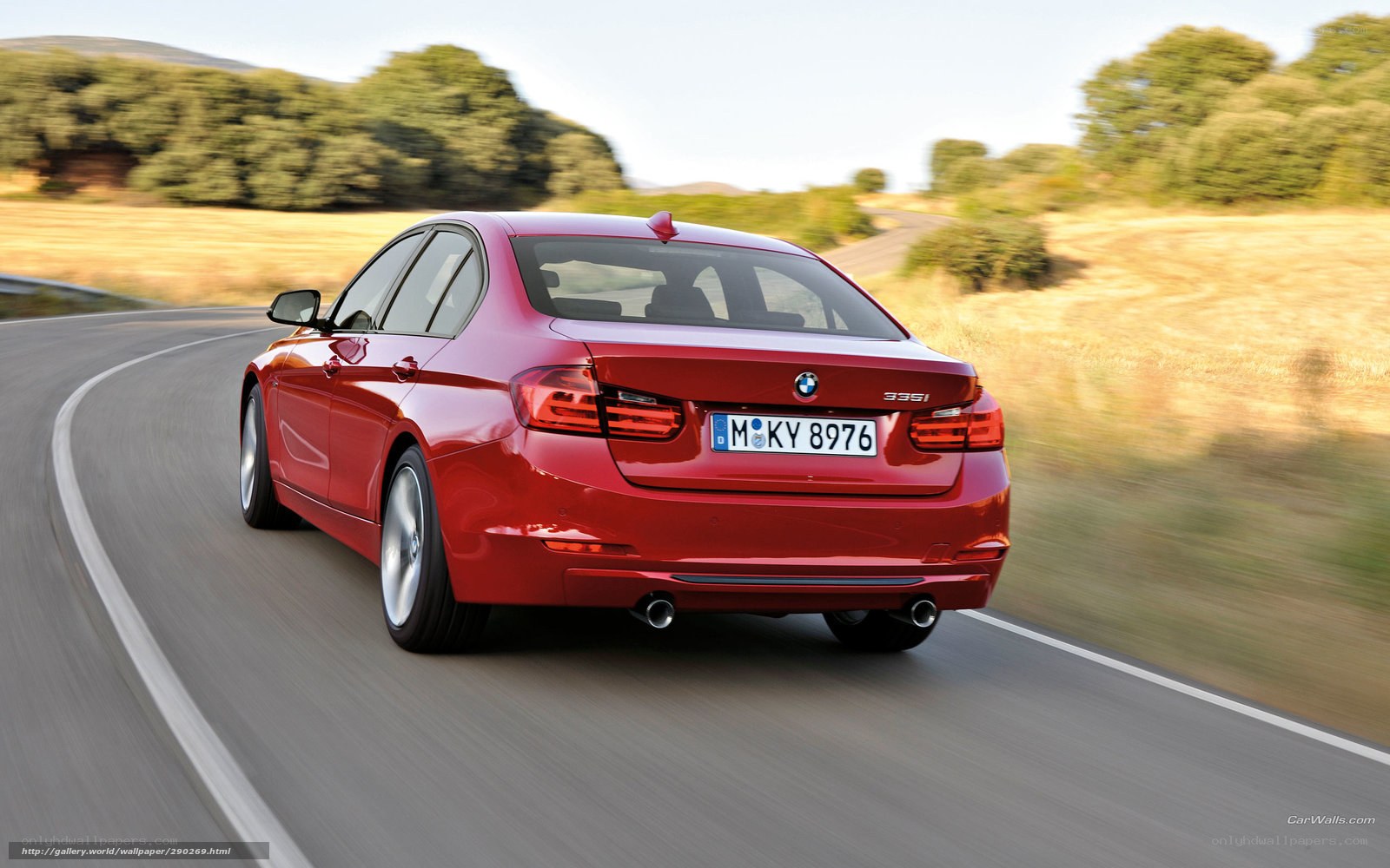 red bmw 335i in motion
