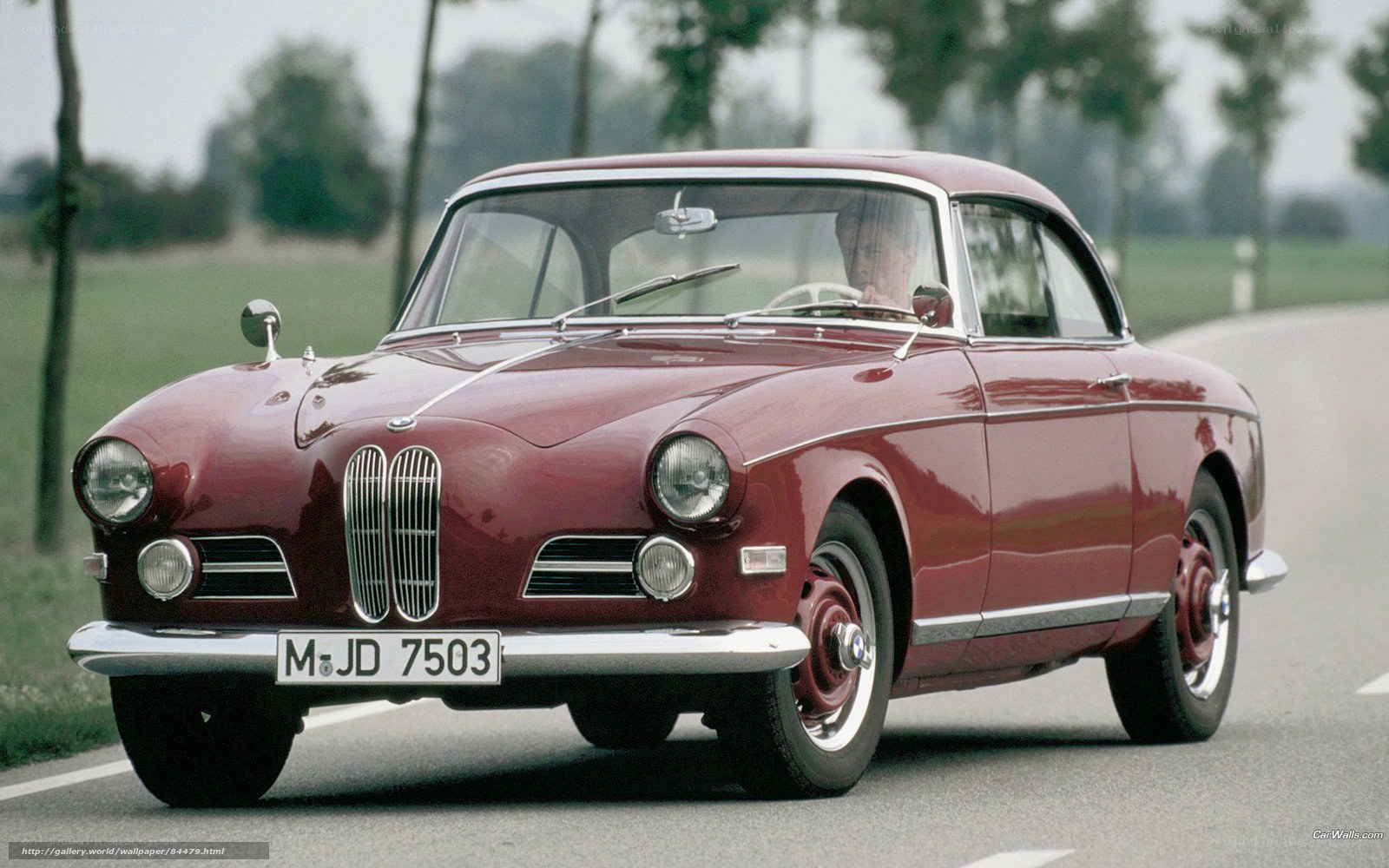 Red BMW 503 on a country road