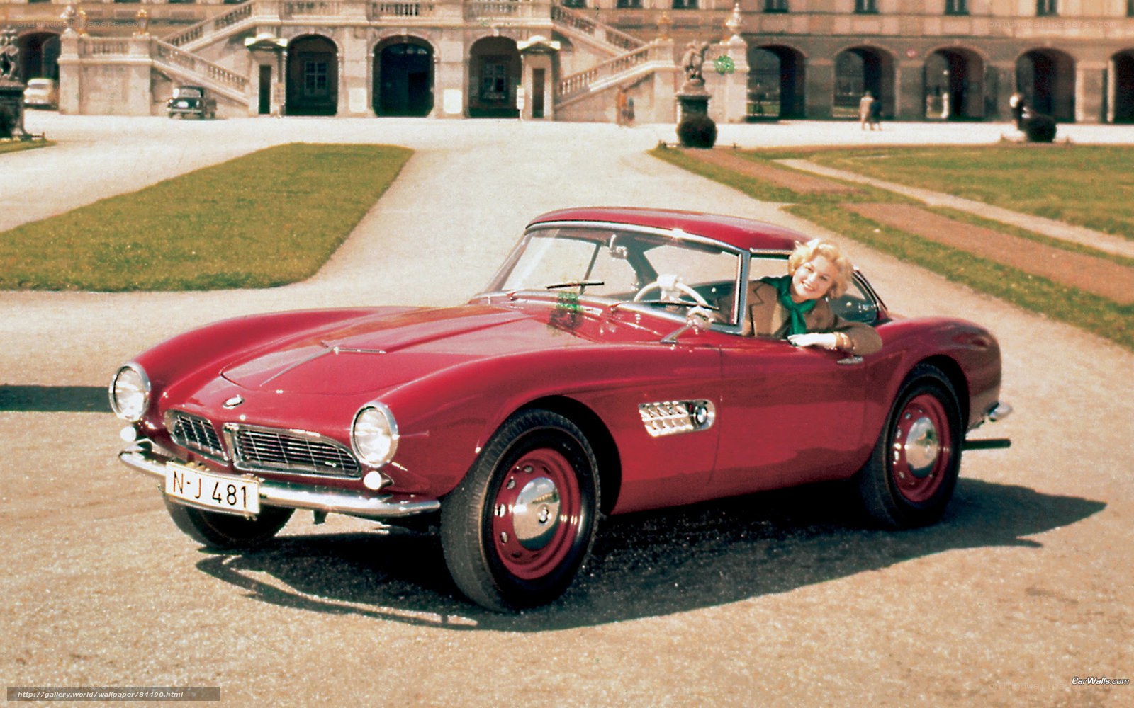 Red BMW 507 with woman