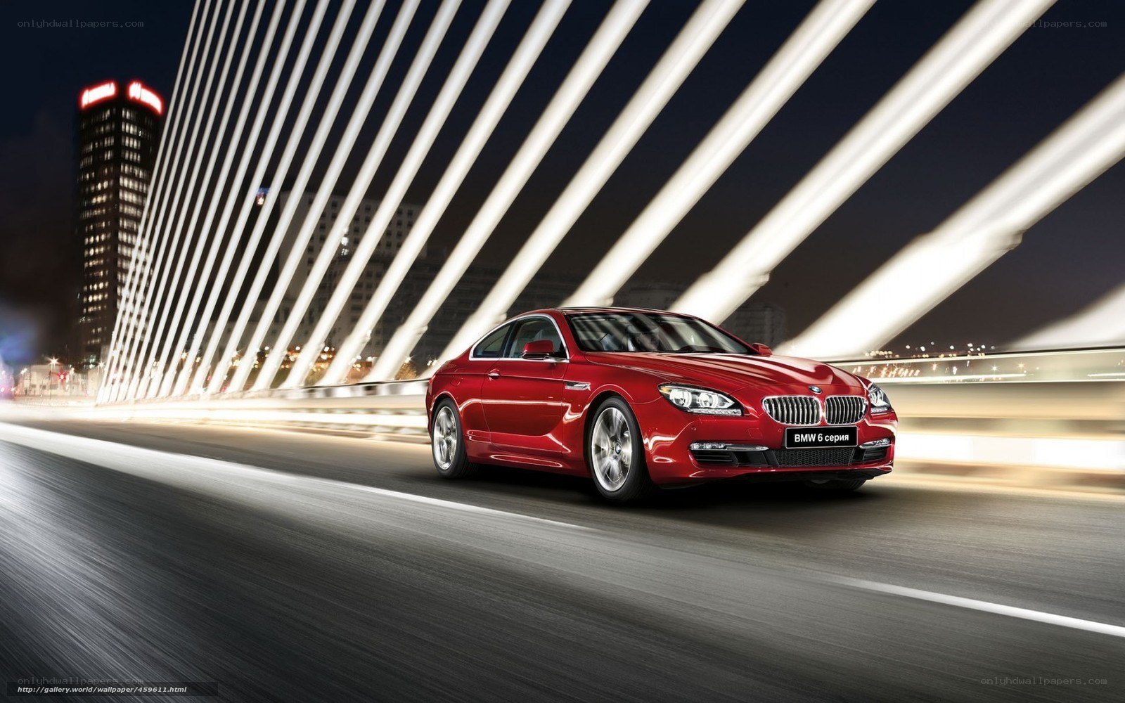Red BMW 6 Series at night