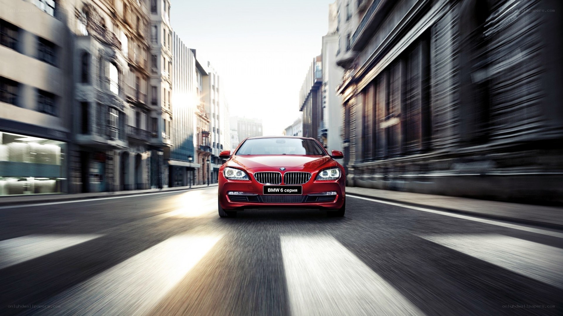 Red BMW 6 Series in city