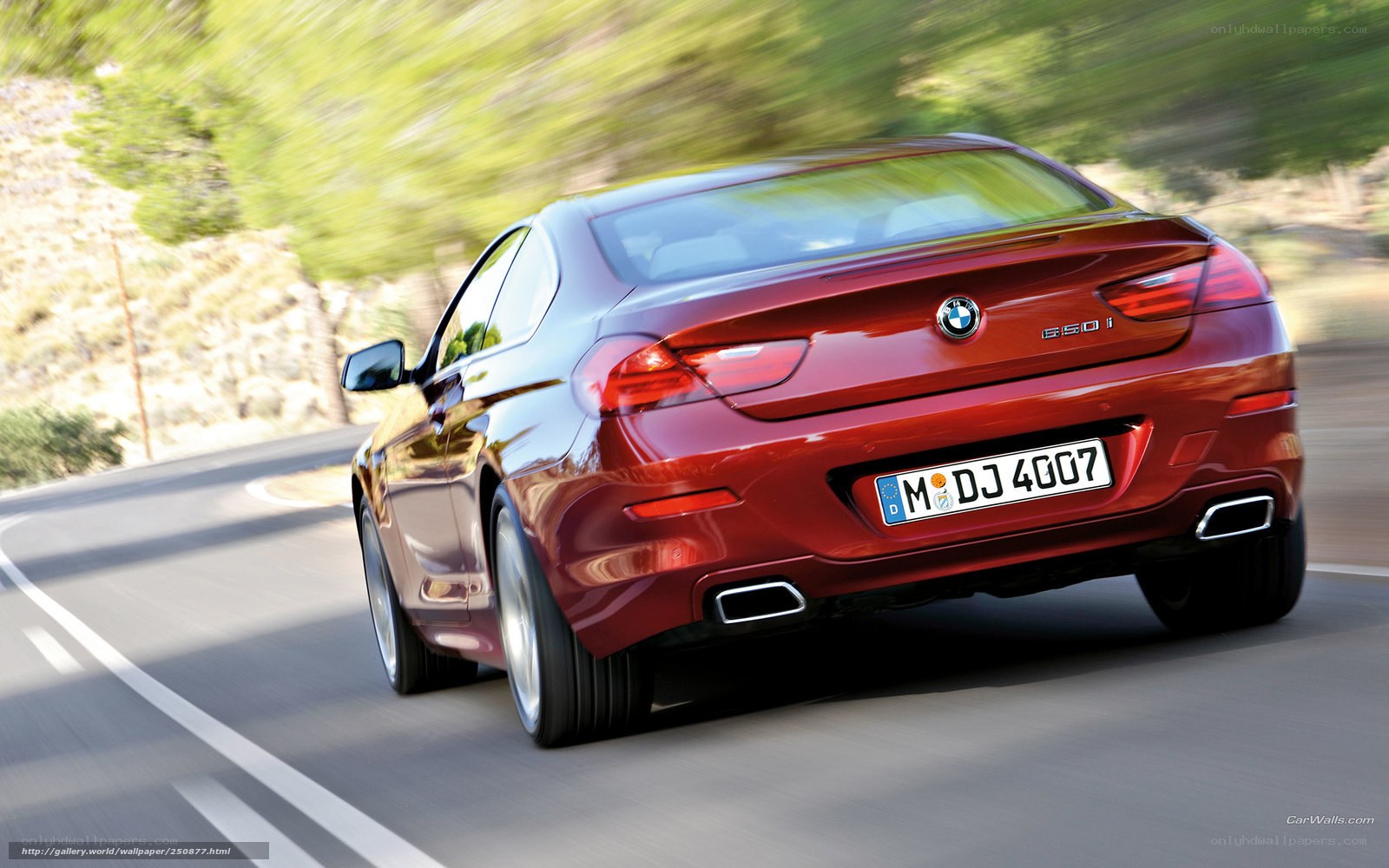 Red BMW 650i in motion