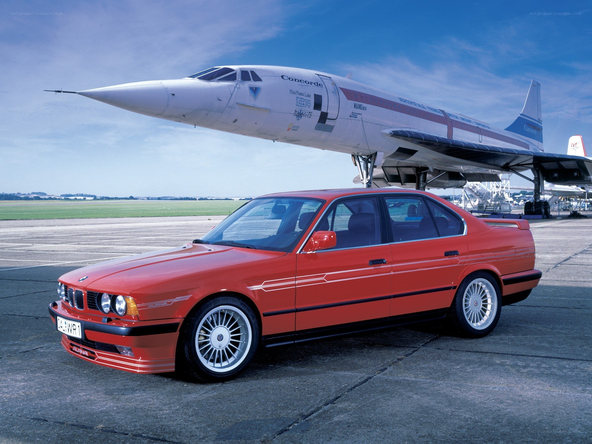 Red BMW and Concorde aircraft