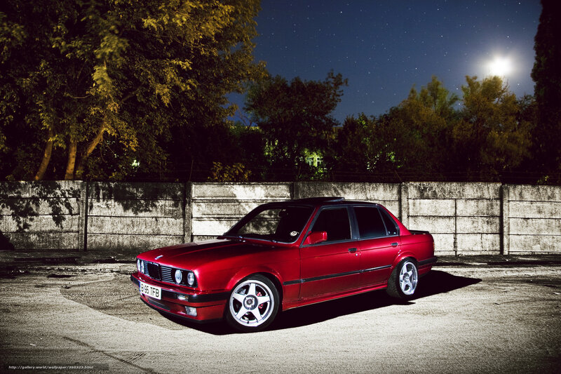 Red BMW at night