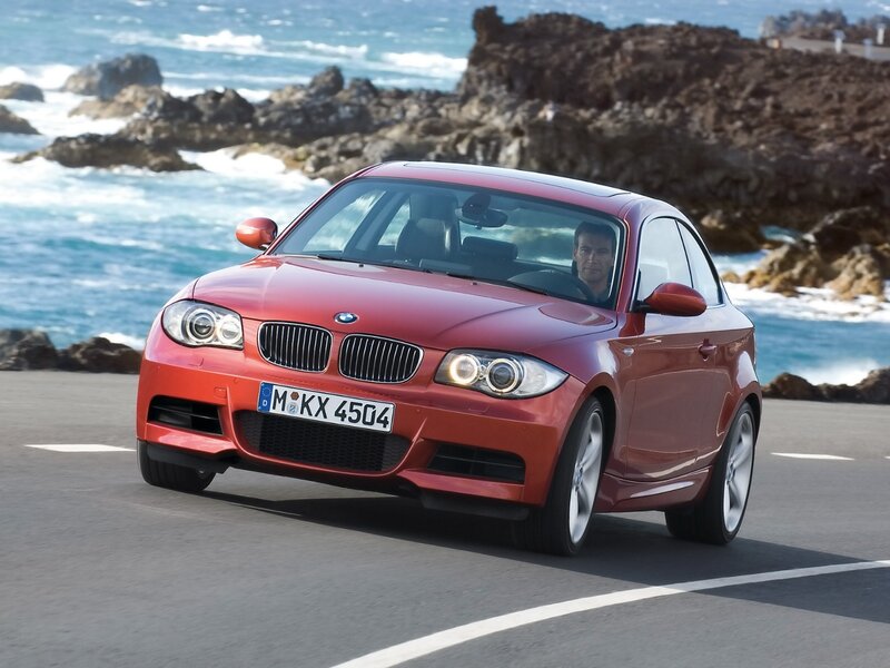 Red Bmw Car — Dynamic, Afternoon, Photograph, Ocean, Rocks
