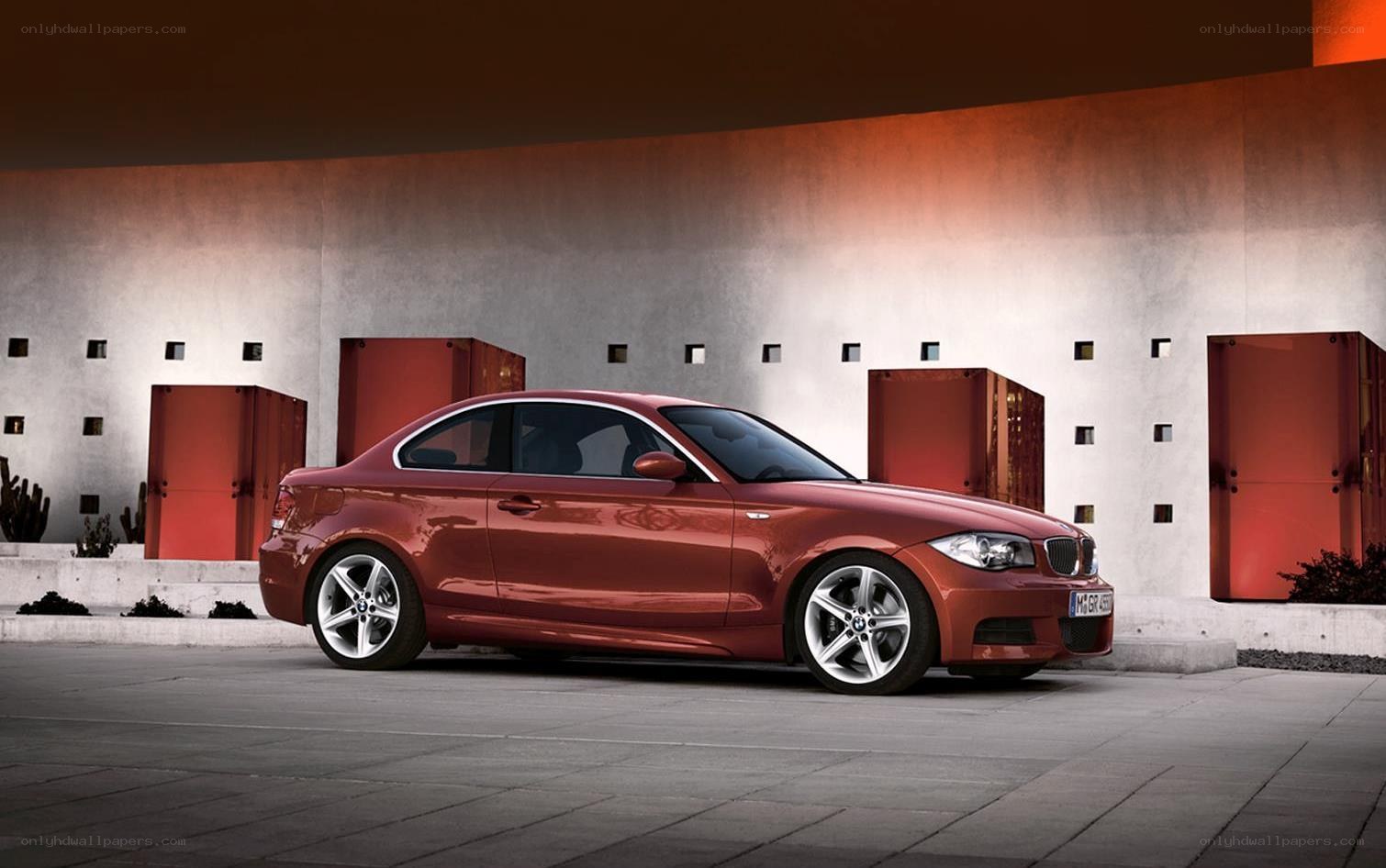 Red BMW coupe in modern setting