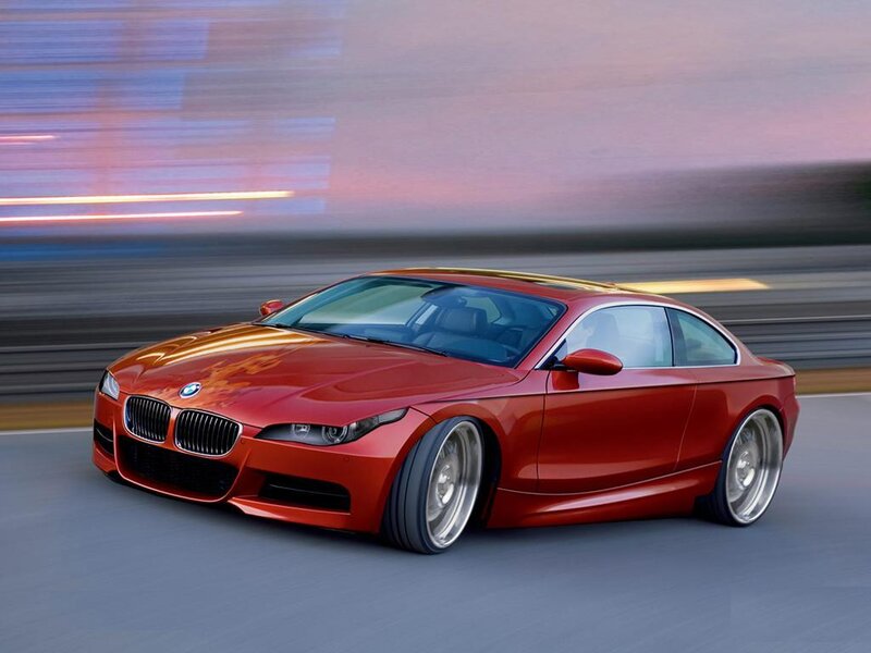 Red BMW coupe in motion