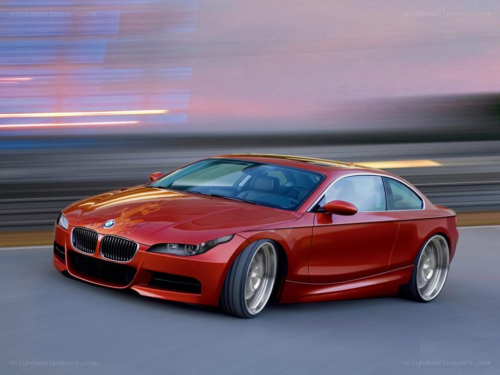 Red BMW coupe in motion