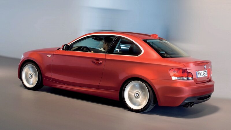 Red BMW coupe in studio