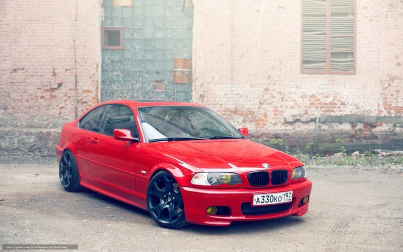 red bmw coupe parked
