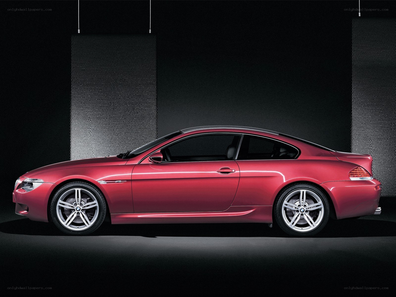 Red BMW coupe side profile