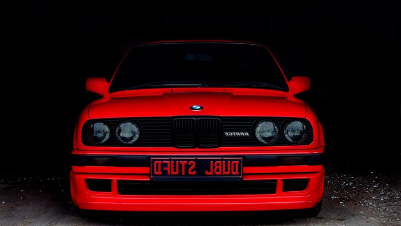 red bmw e30 front view