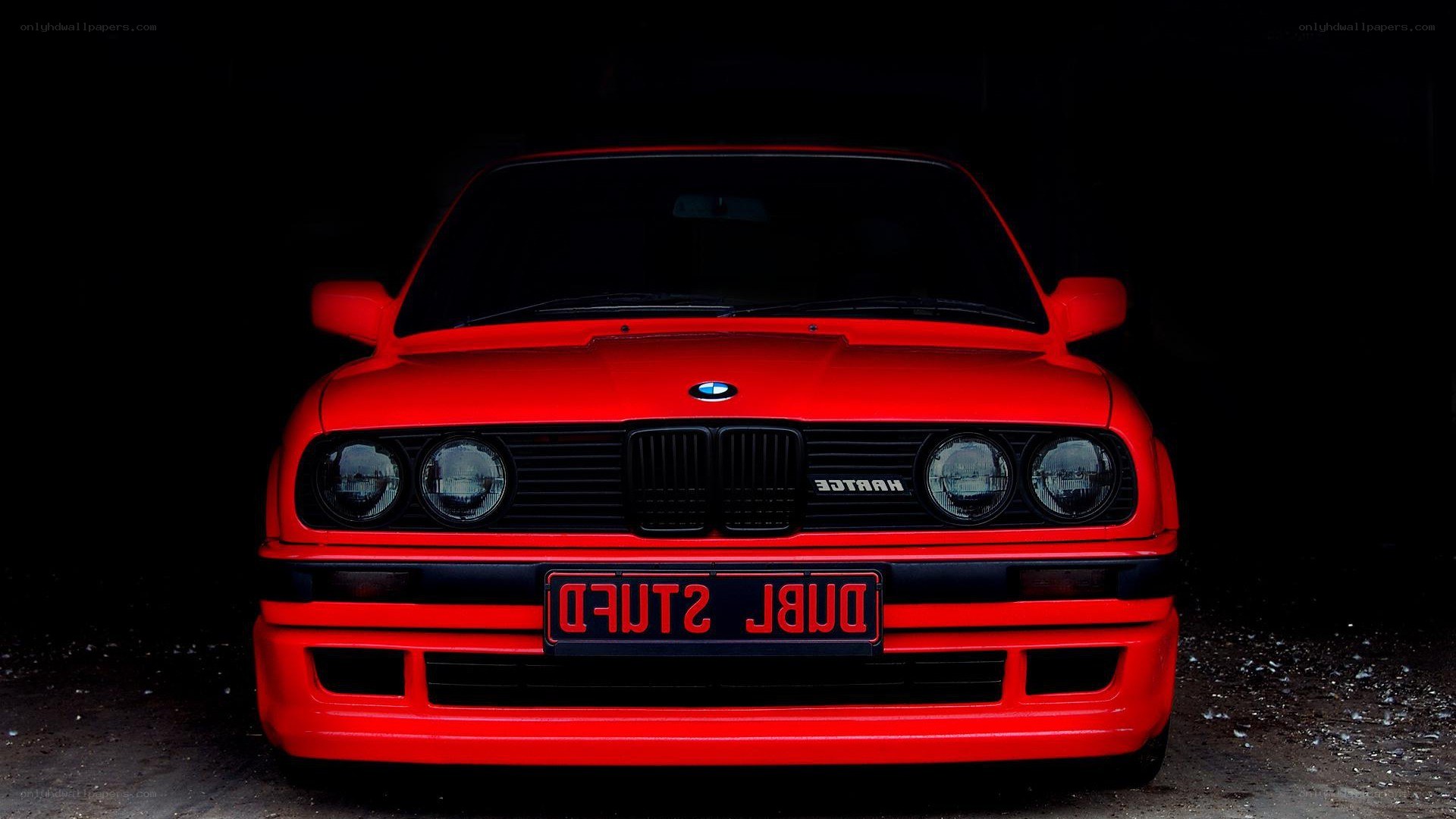 red bmw e30 front view