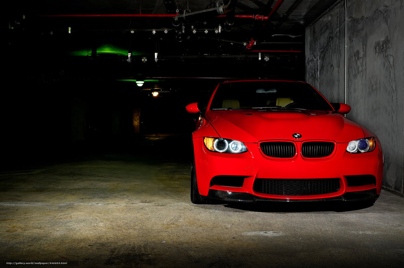 Red BMW in parking garage