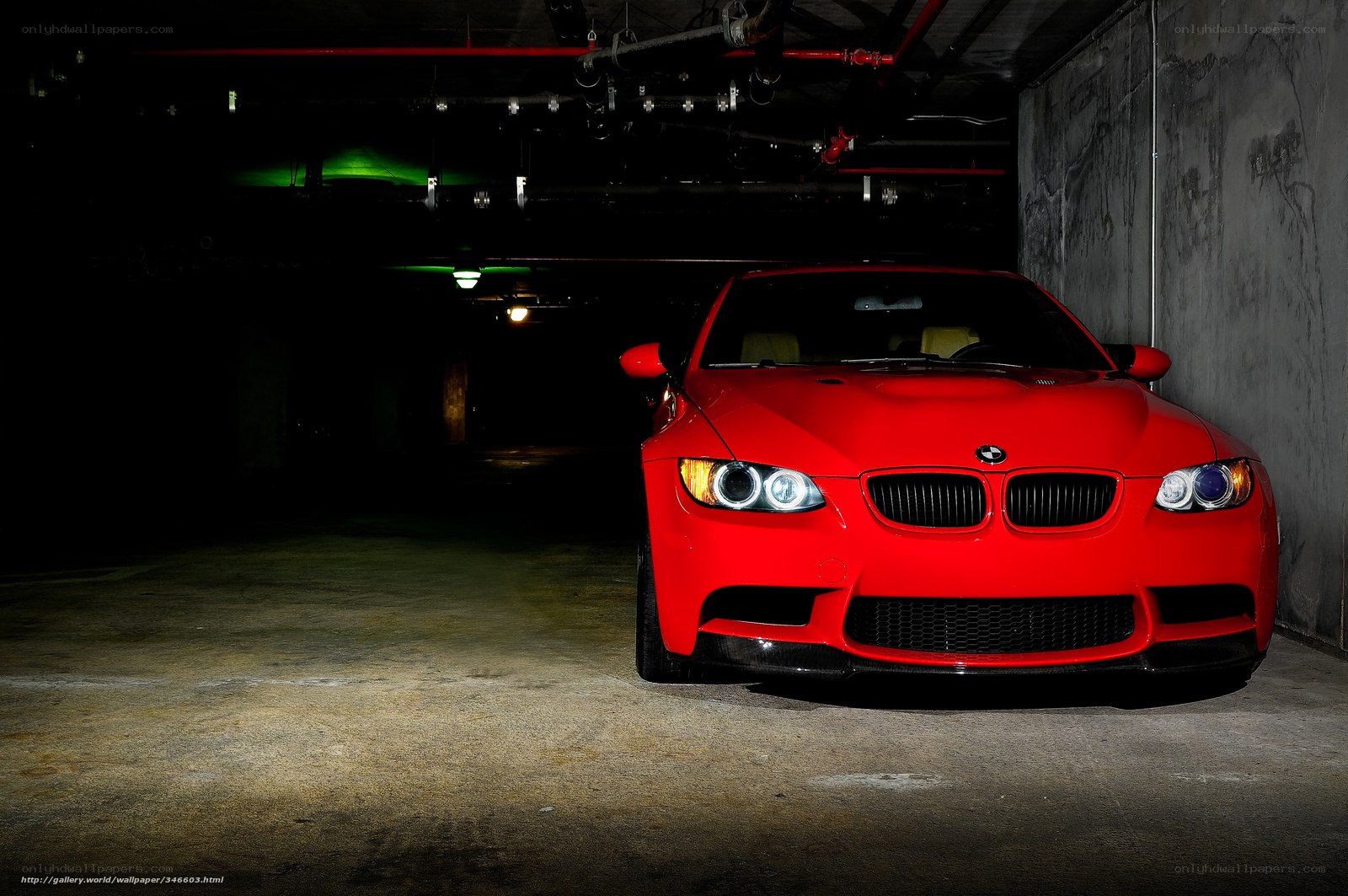 Red BMW in parking garage