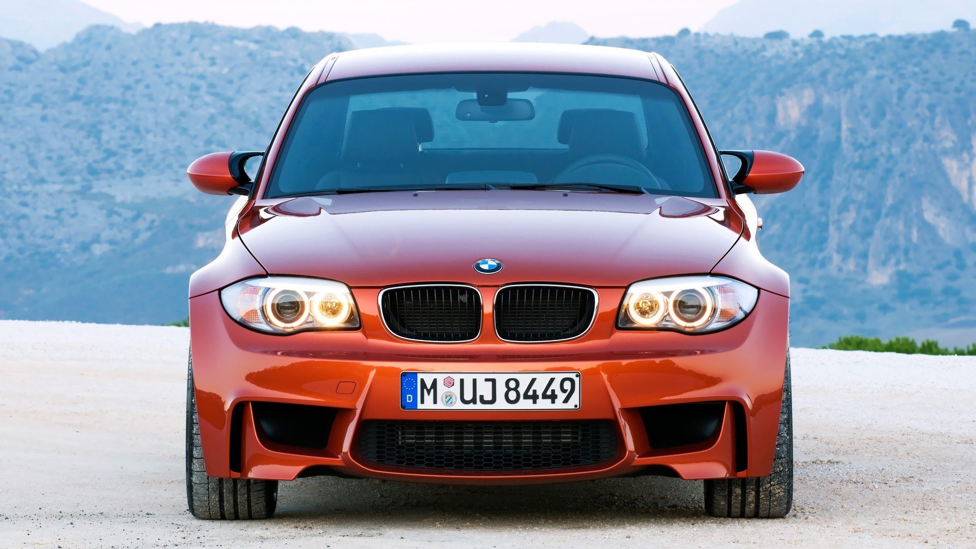Red BMW M135i front view