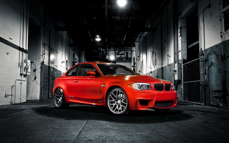 Red BMW M135i in warehouse