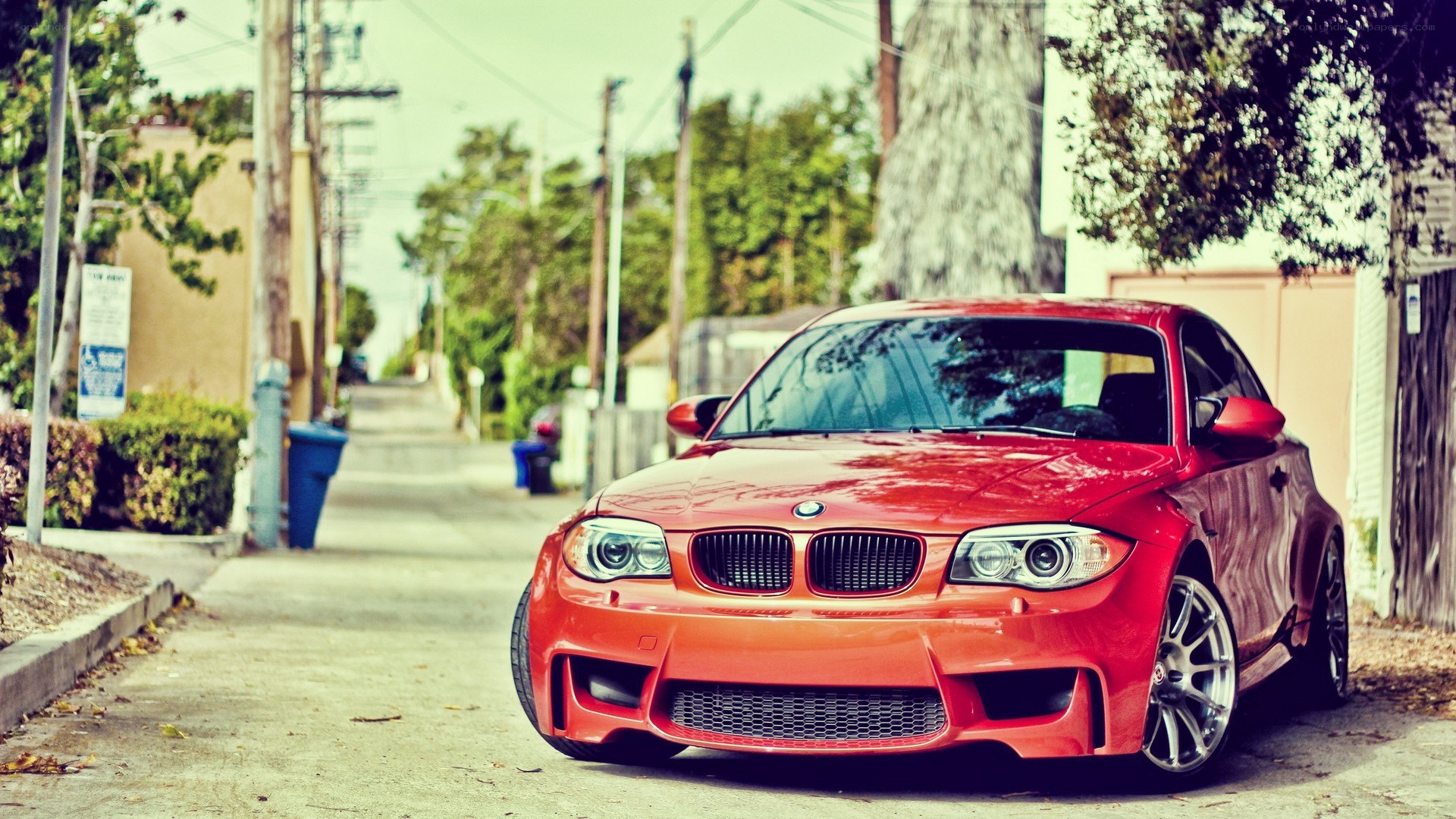 red bmw m135i on a street