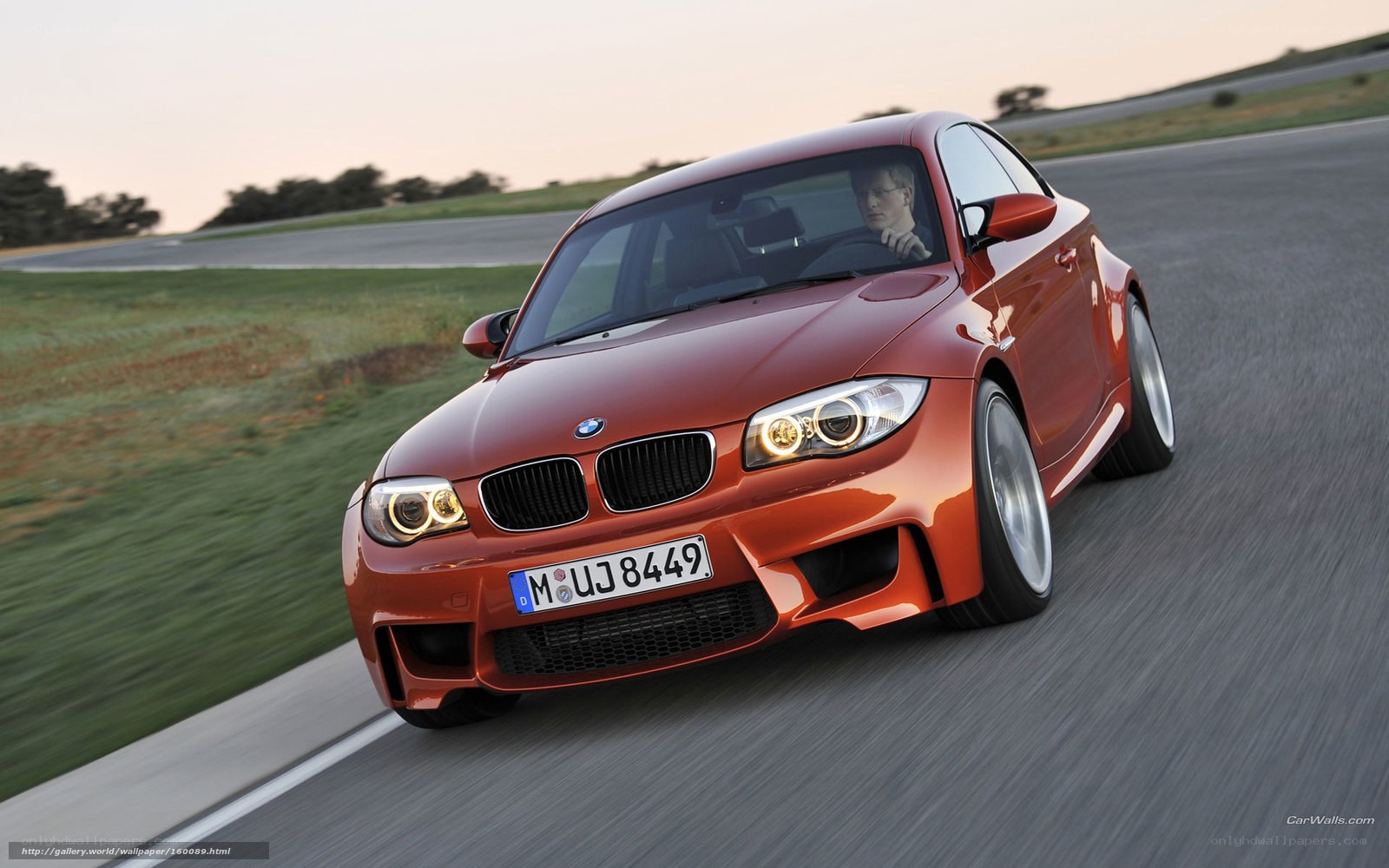 red bmw m135i on track
