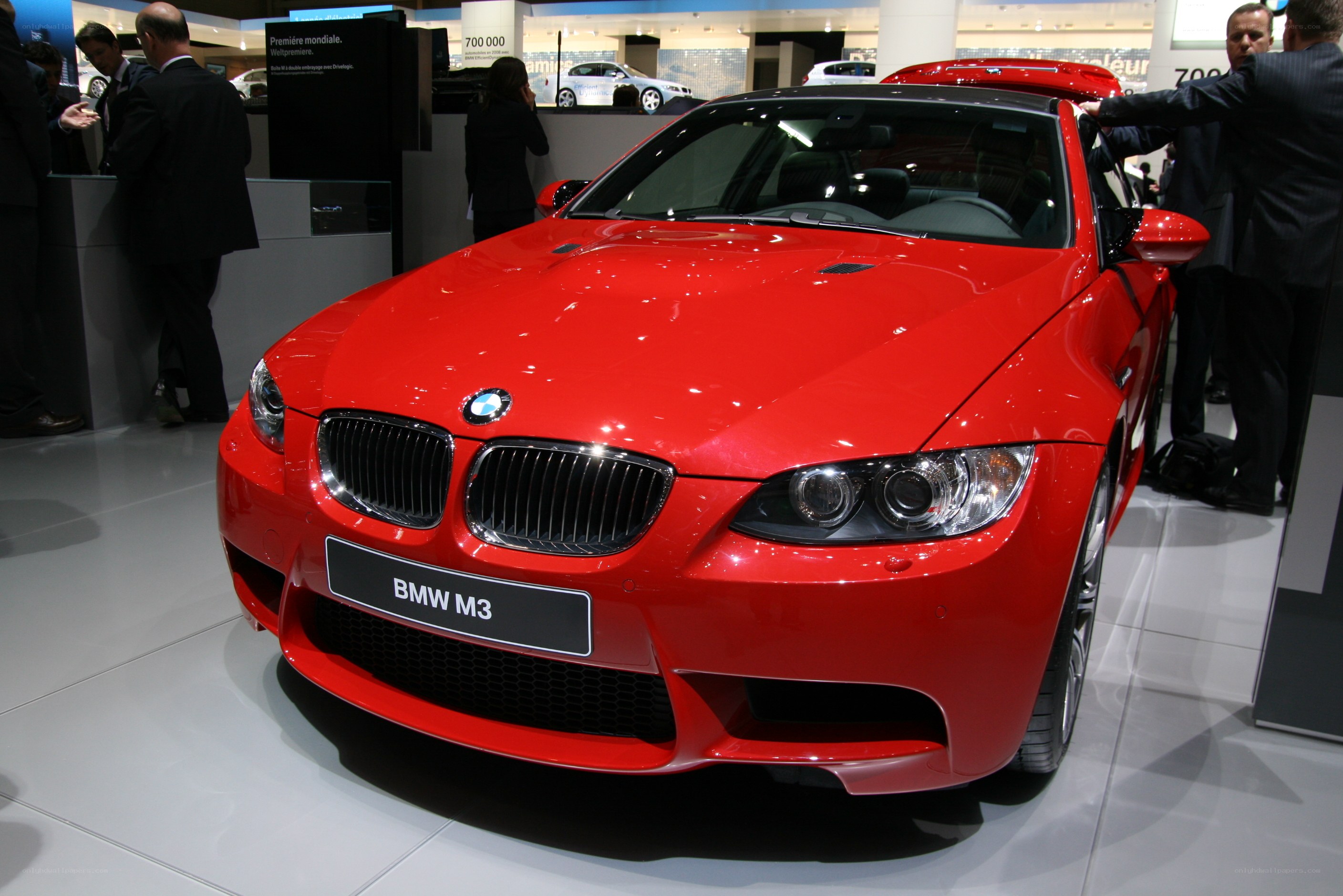 Red BMW M3 at auto show