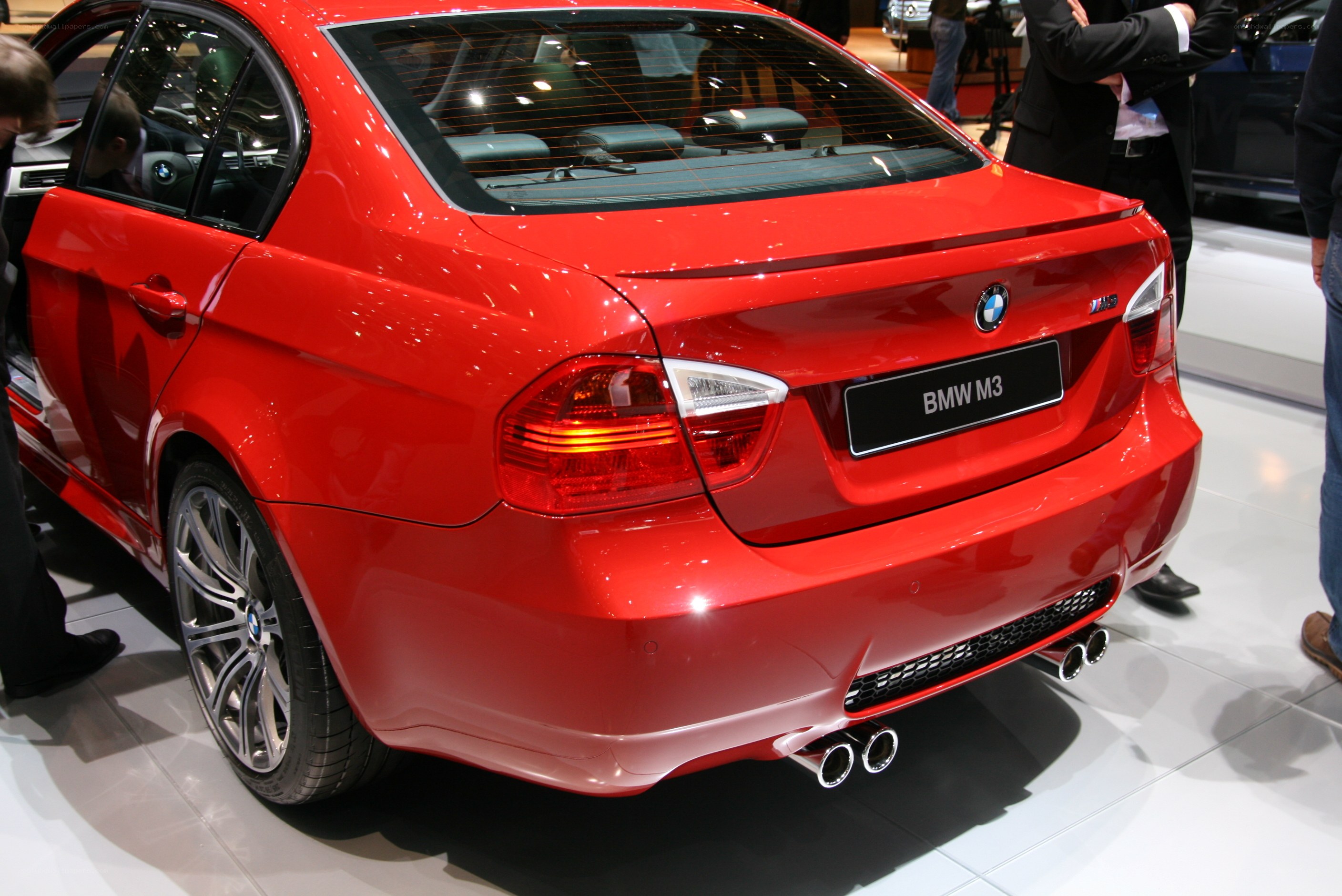 Red BMW M3 at auto show