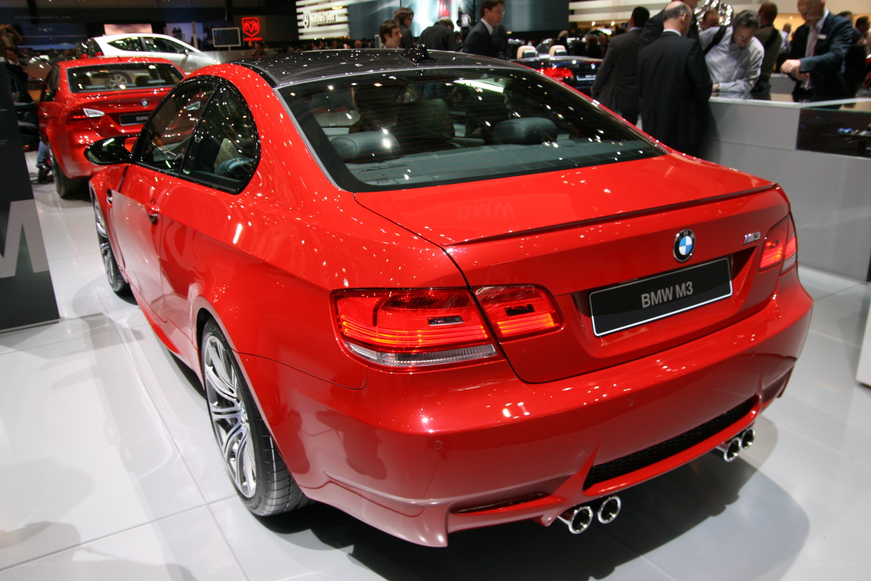 Red BMW M3 at auto show