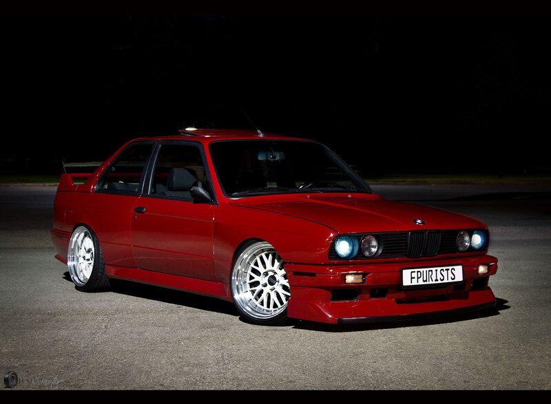 Red BMW M3 at night