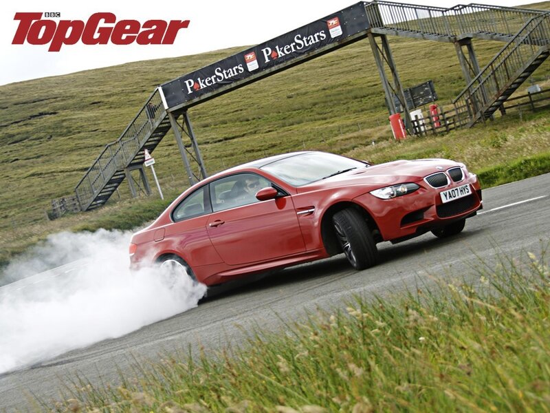 Red BMW M3 drifting