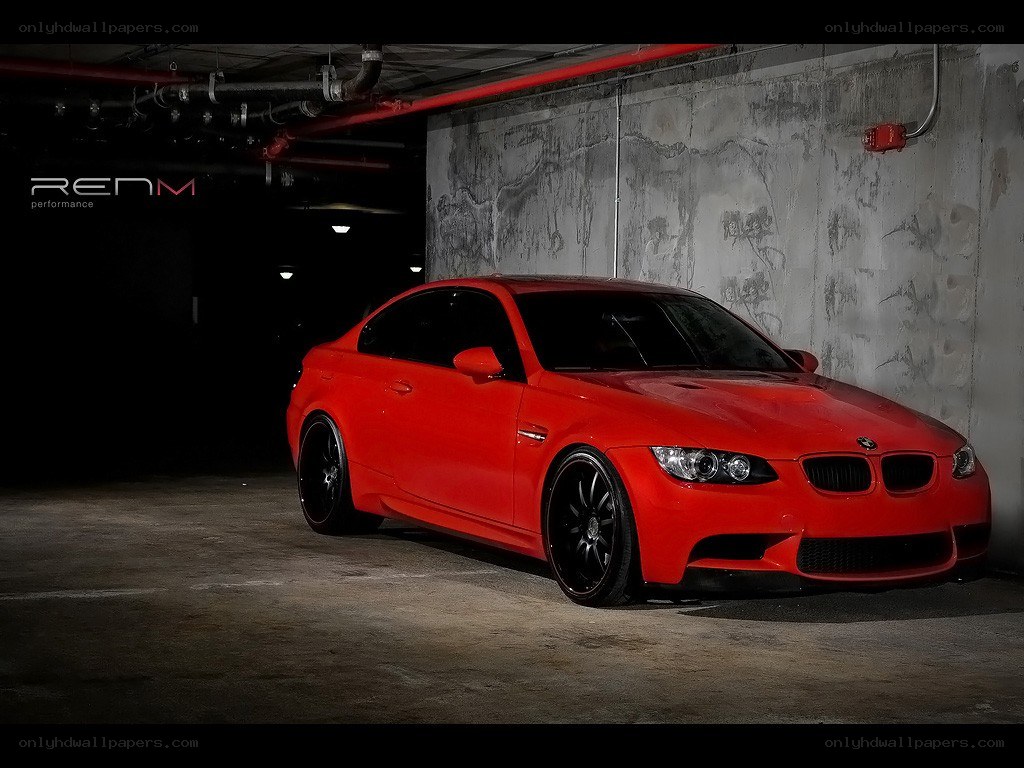 Red BMW M3 in garage
