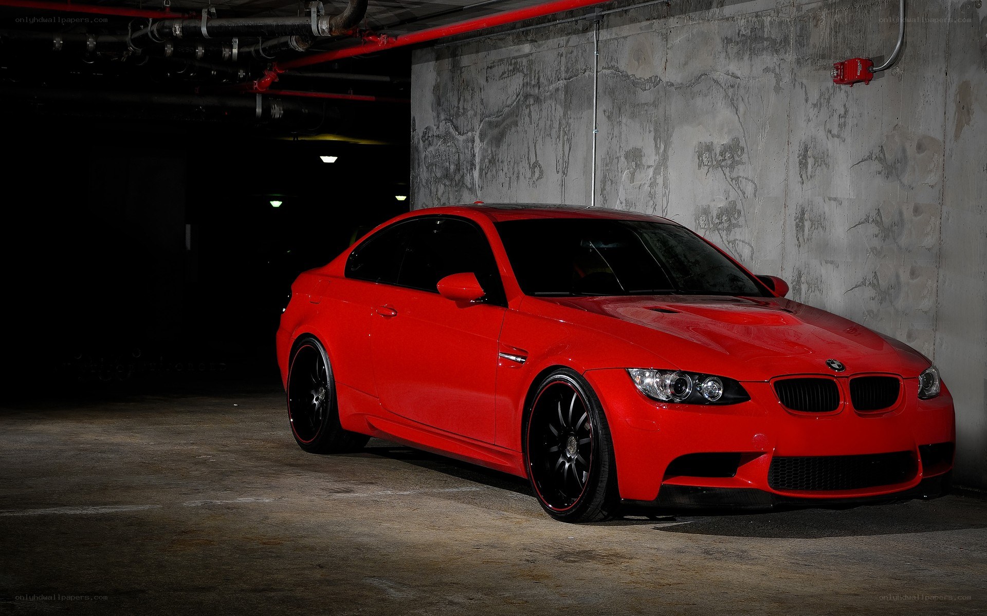 red bmw m3 in garage