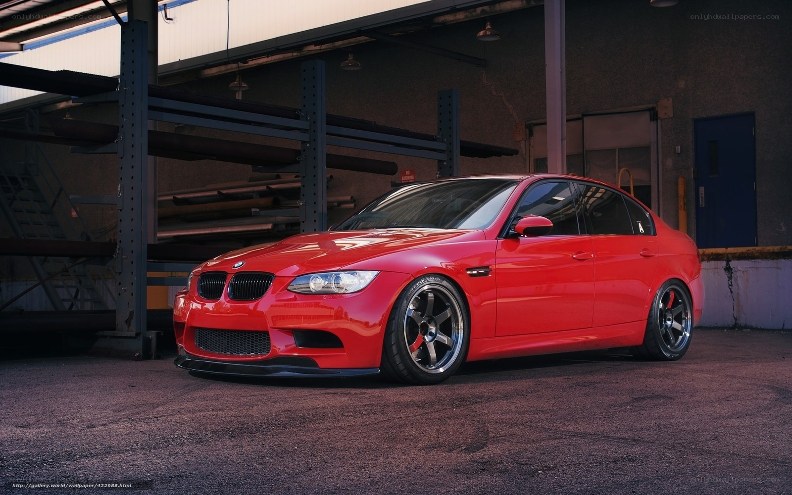Red BMW M3 in garage