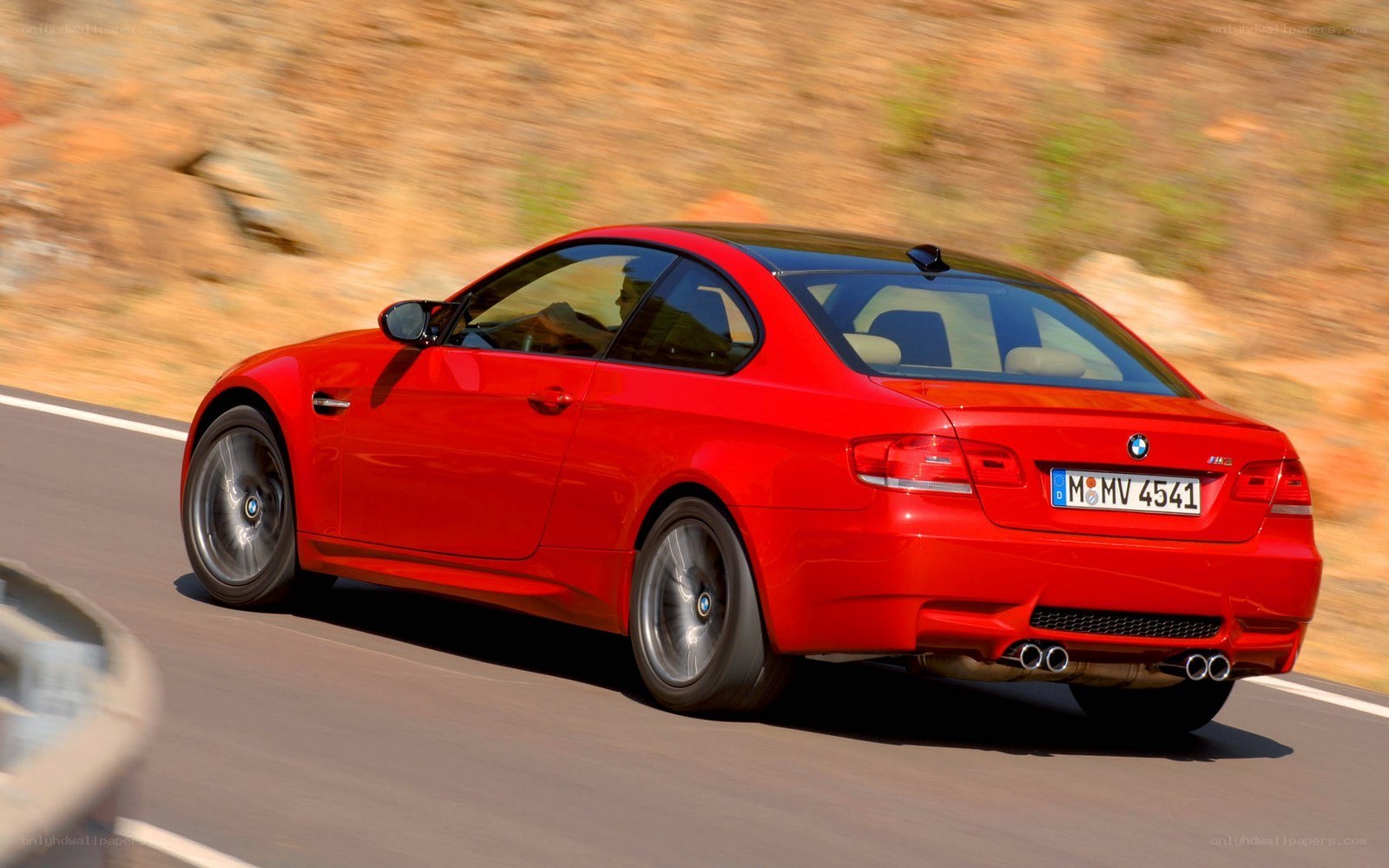 red bmw m3 in motion