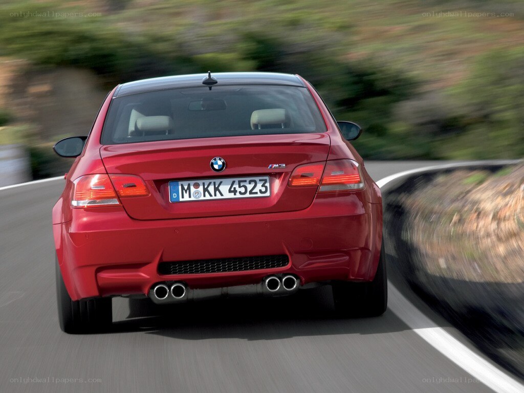 red bmw m3 in motion