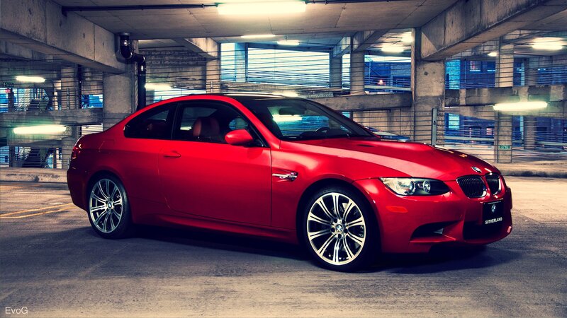 Red BMW M3 in parking garage