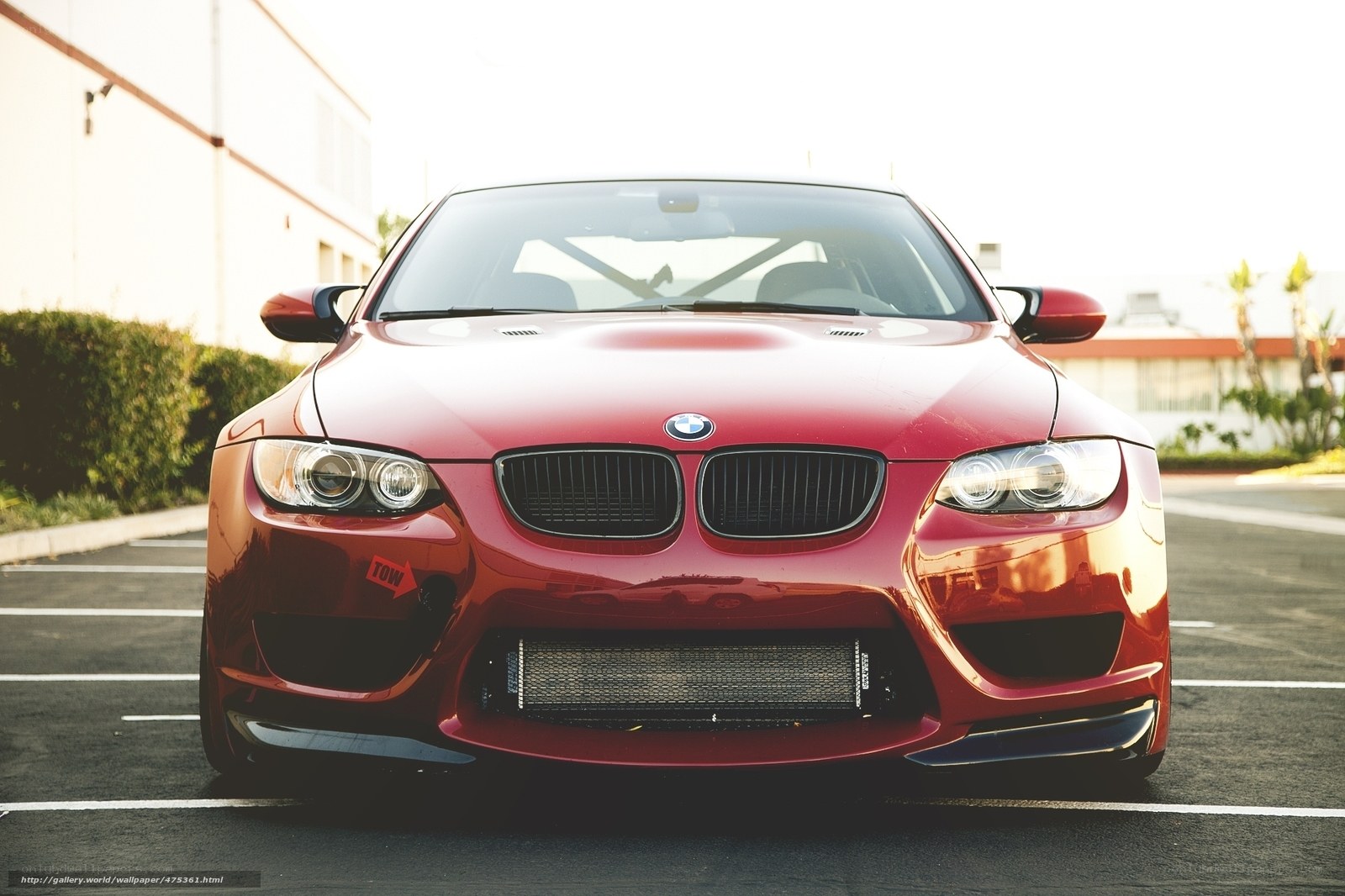 Red BMW M3 in parking lot