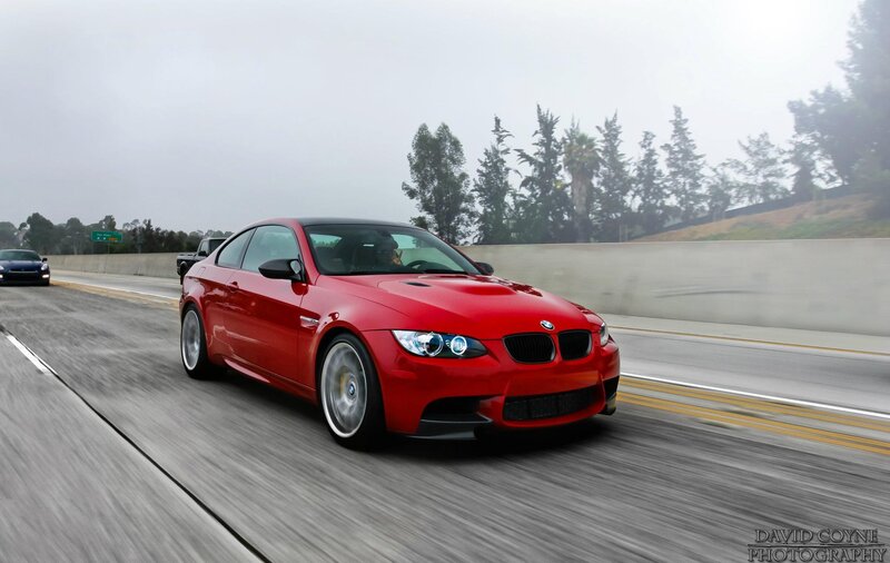 Red BMW M3 on a highway