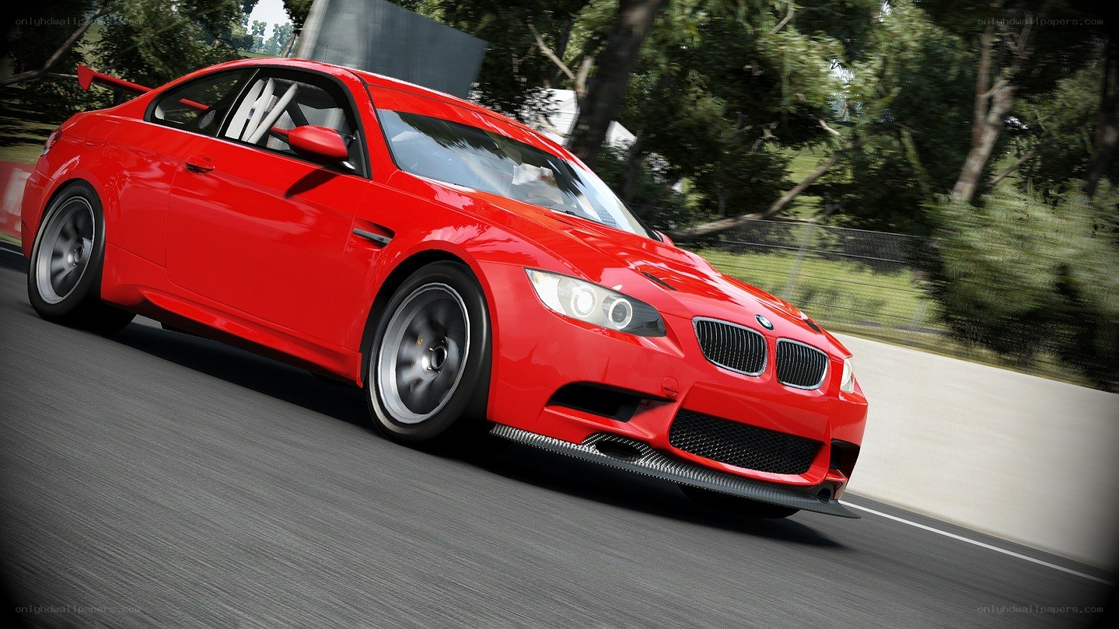 red bmw m3 on a racetrack