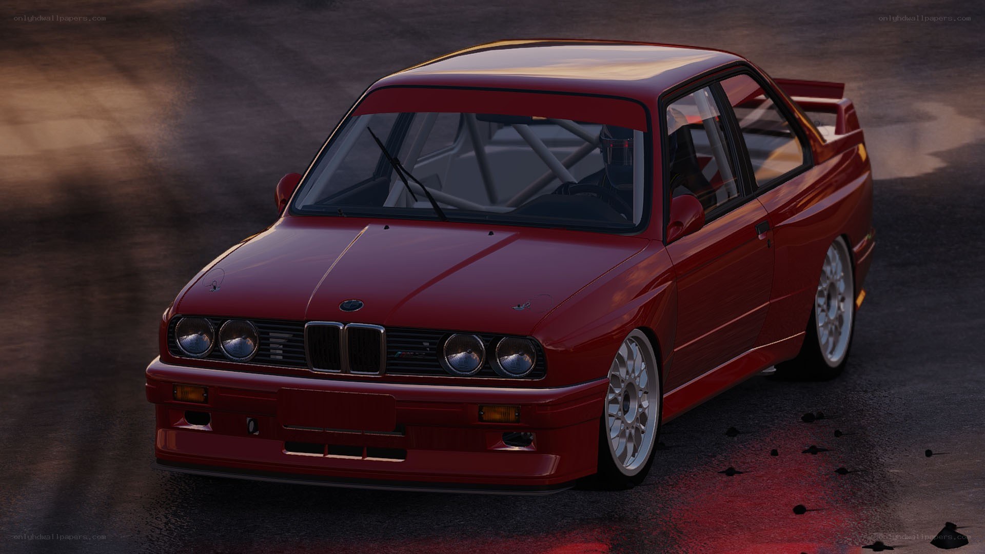 Red BMW M3 on a racetrack