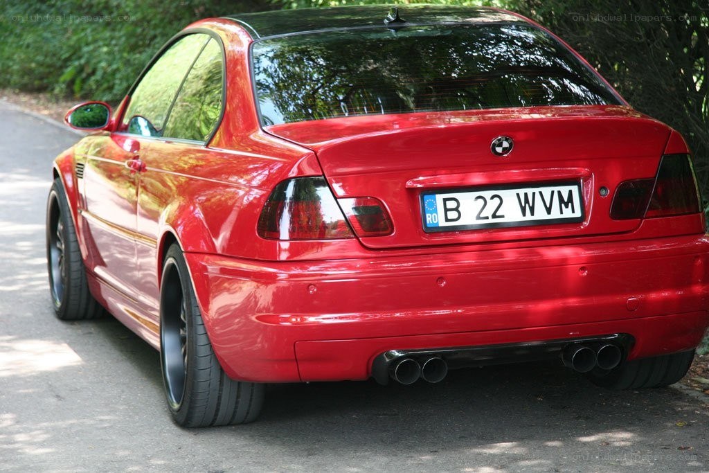 Red BMW M3 on a road