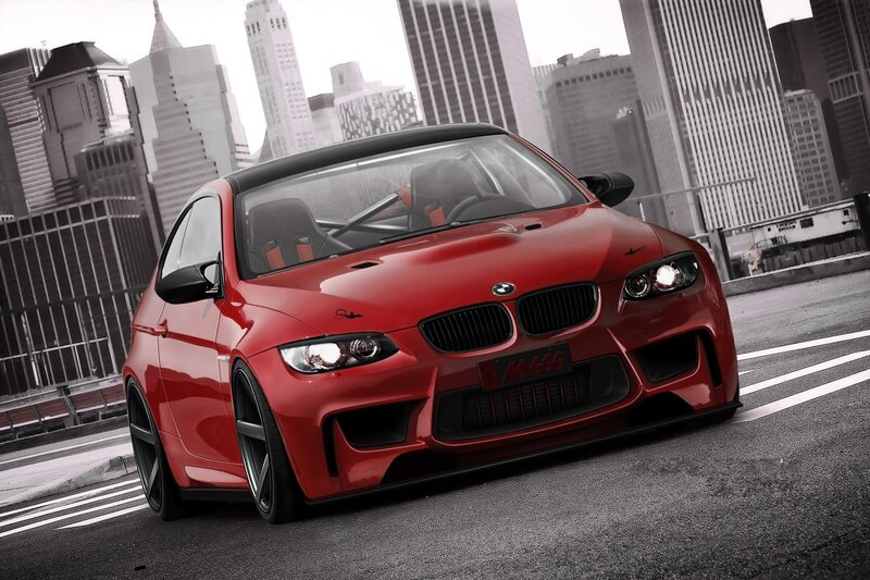 red bmw m3 on city street