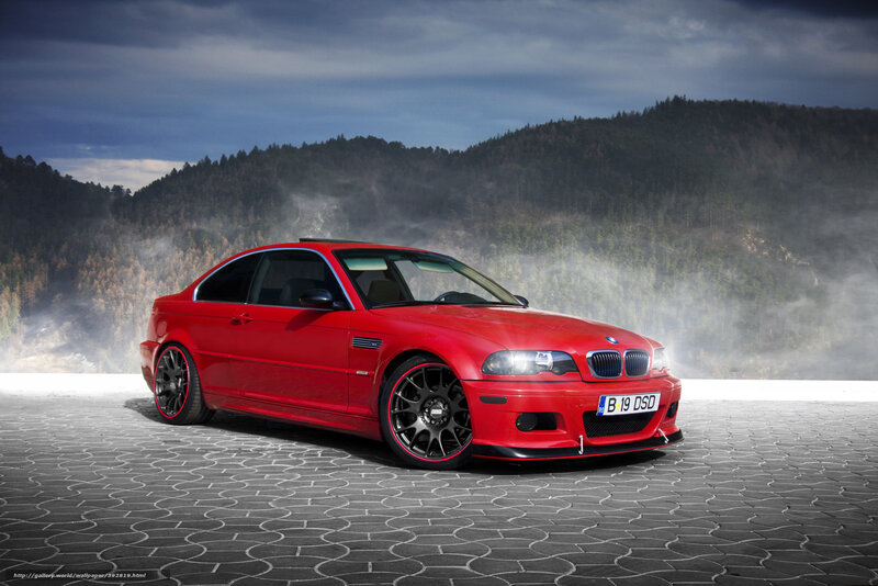 Red BMW M3 on cobblestones