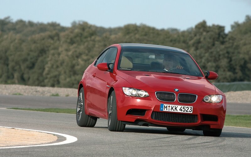 red bmw m3 on racetrack