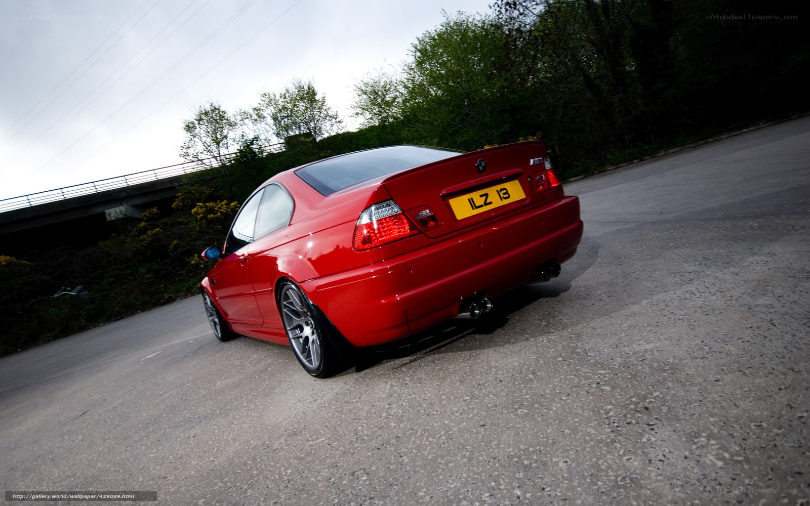 red bmw m3 on road