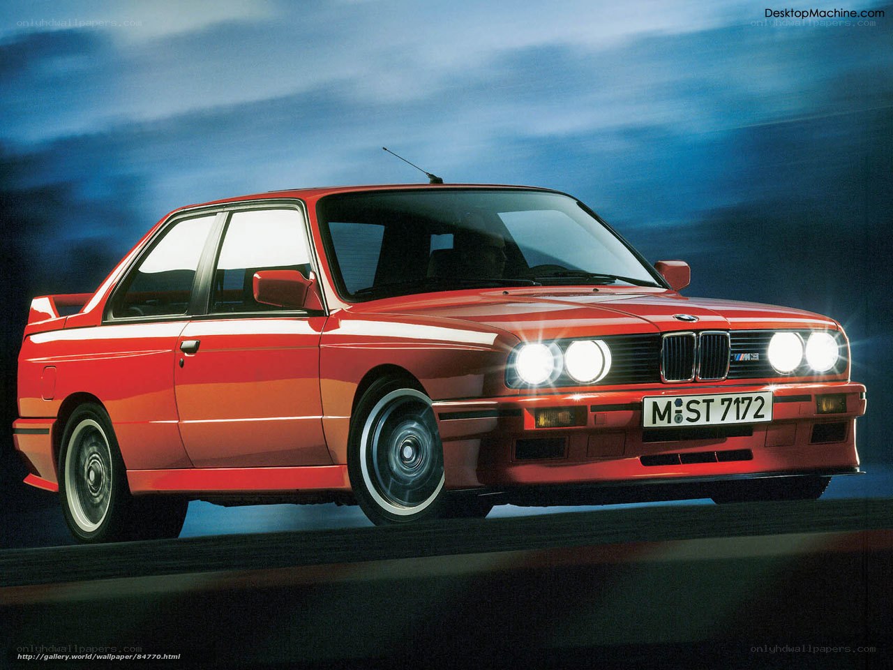 Red BMW M3 on road