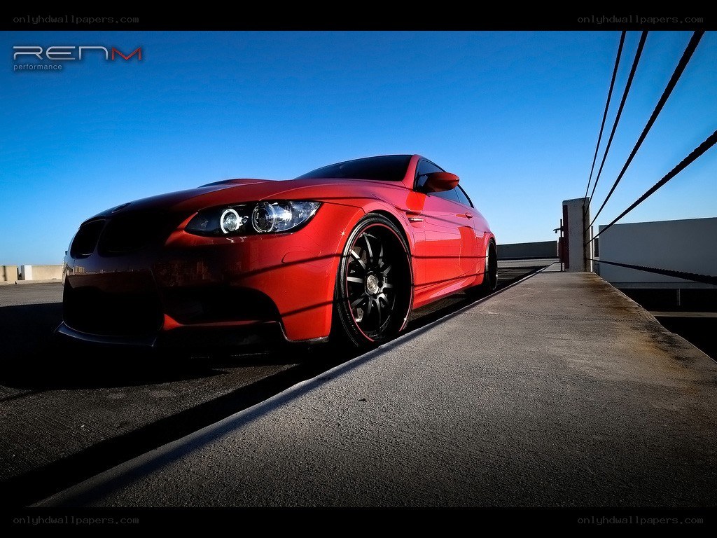 red bmw m3 on rooftop