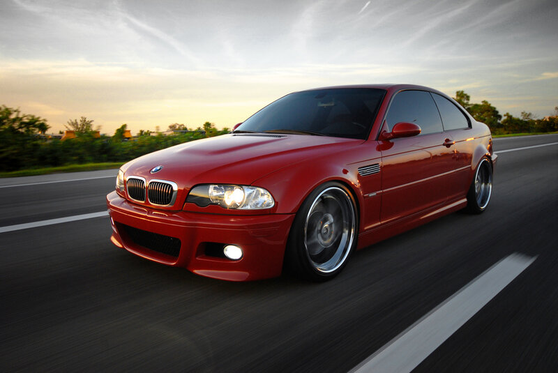 red bmw m3 on the road