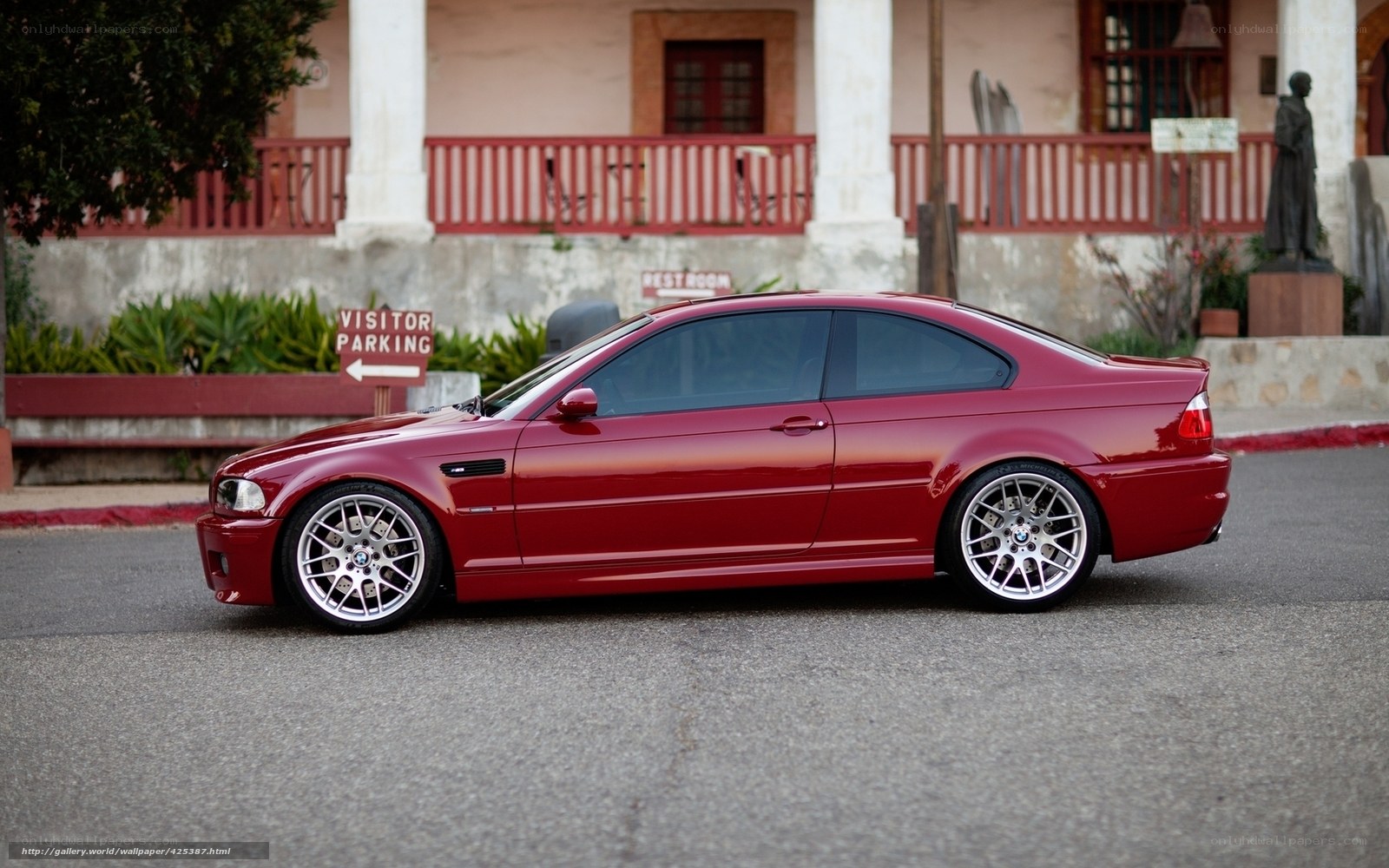Red BMW M3 parked outside
